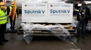 Feature photo | Boxes loaded with the Russian Sputnik V COVID-19 vaccine arrive at Tunis airport, March 9, 2021. Hassene Dridi | AP